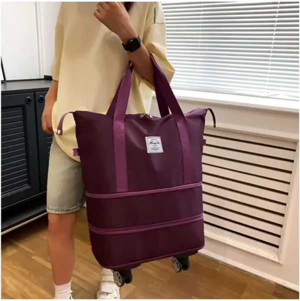 شنطة سفر بعجل قابلة للطي بتوسيع ذكي وسعة ضخمة - Foldable Rolling Travel Bag with Smart Expansion